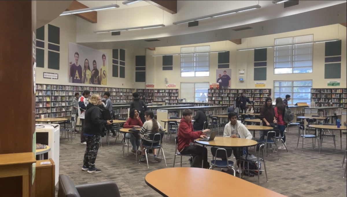 Students gathered up in the library to take the test under Mrs. Hasenpflugs supervision.